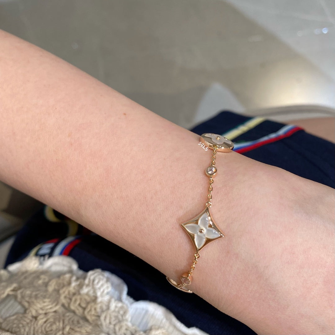 [Luxe]スターアンドサン4モチーフホワイトモップピンクゴールドブレスレット
