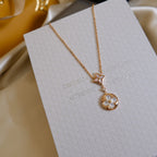 [Luxe] COLLIER EN OR ROSE À 2 MOTIFS ÉTOILE ET SOLEIL BLANC 