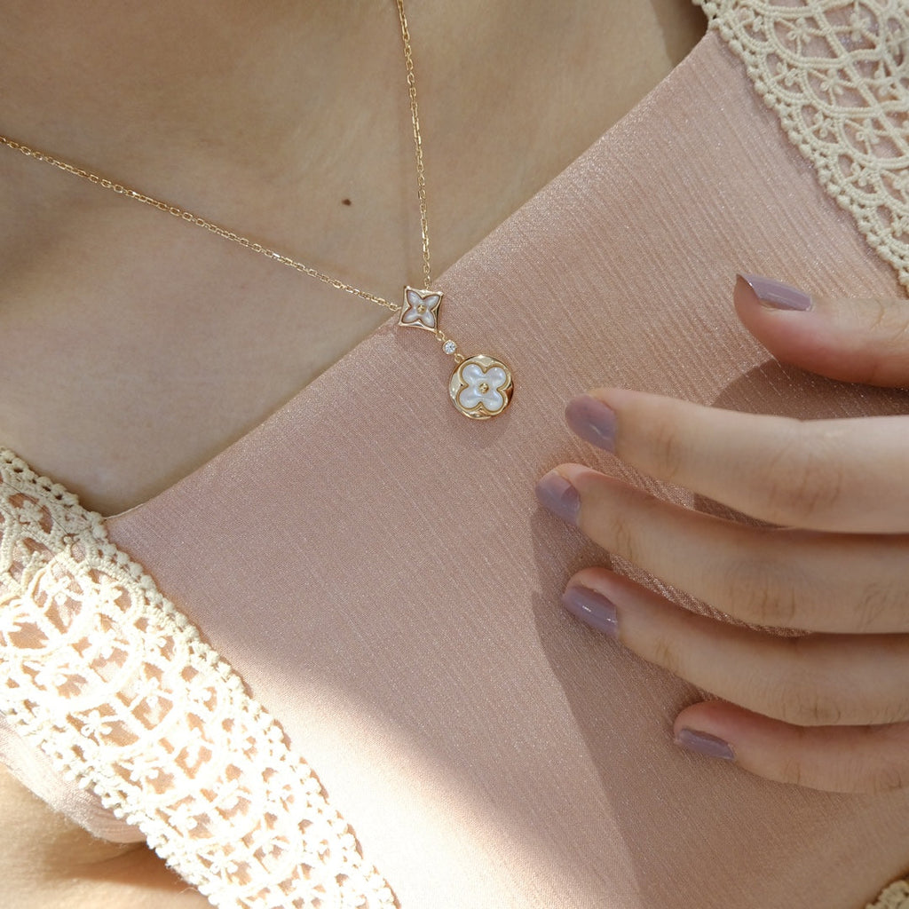[Luxe] COLLIER EN OR ROSE À 2 MOTIFS ÉTOILE ET SOLEIL BLANC 